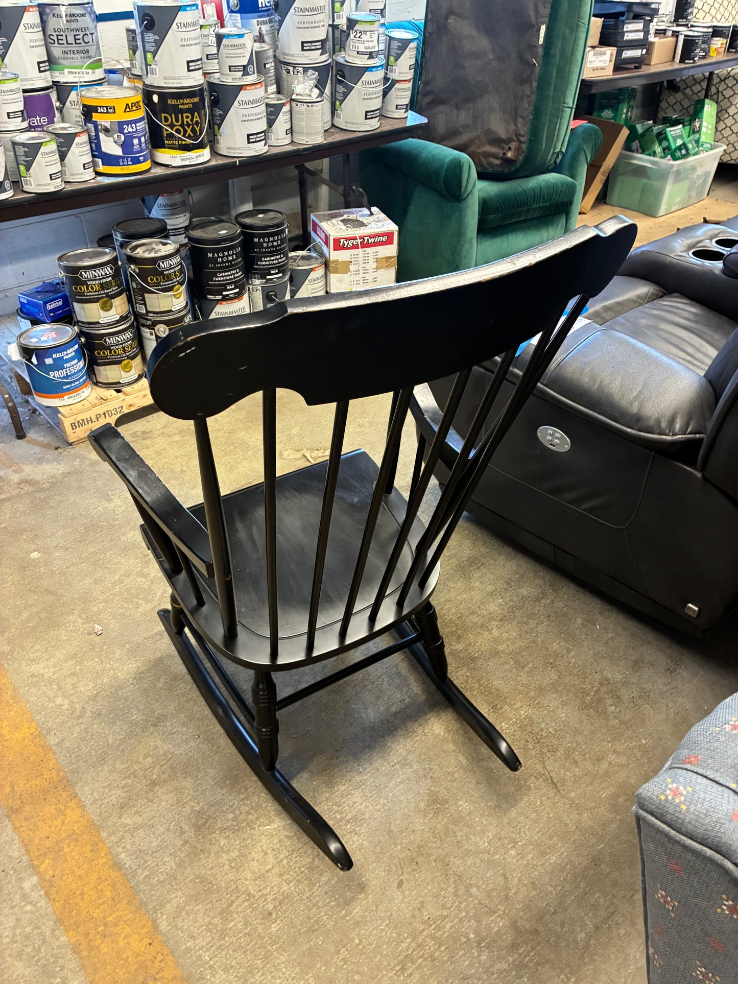 Black Wooden Rocking Chair with Decorative Back Detail