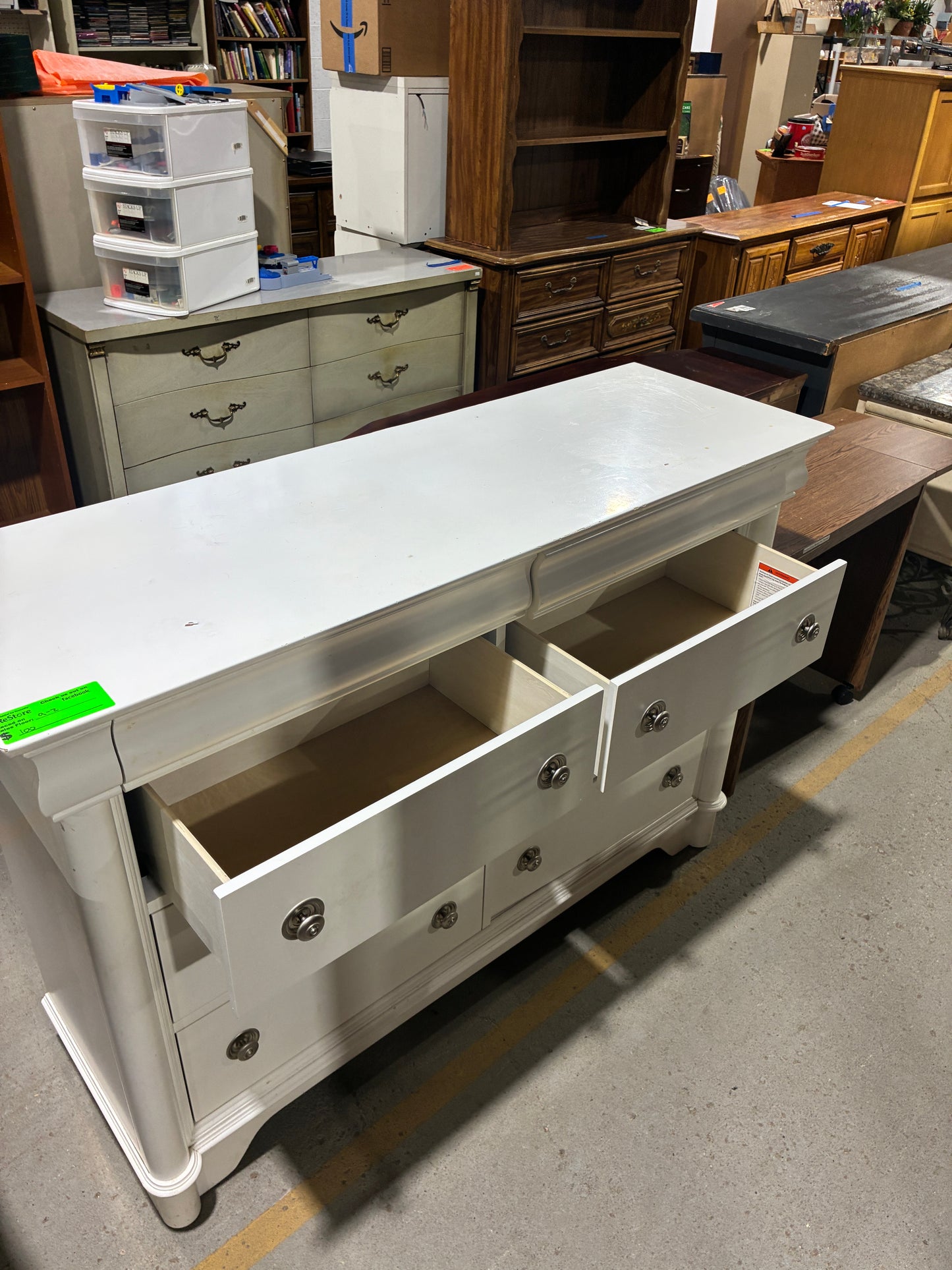 White Nine-Drawer Dresser with Classic Detailing