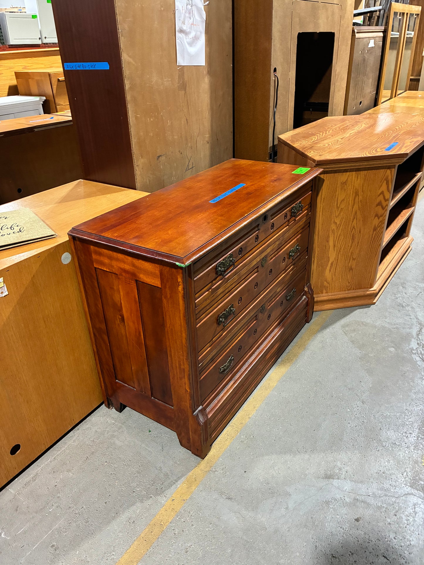 Vintage Three-Drawer Wood Dresser with Ornate Hardware