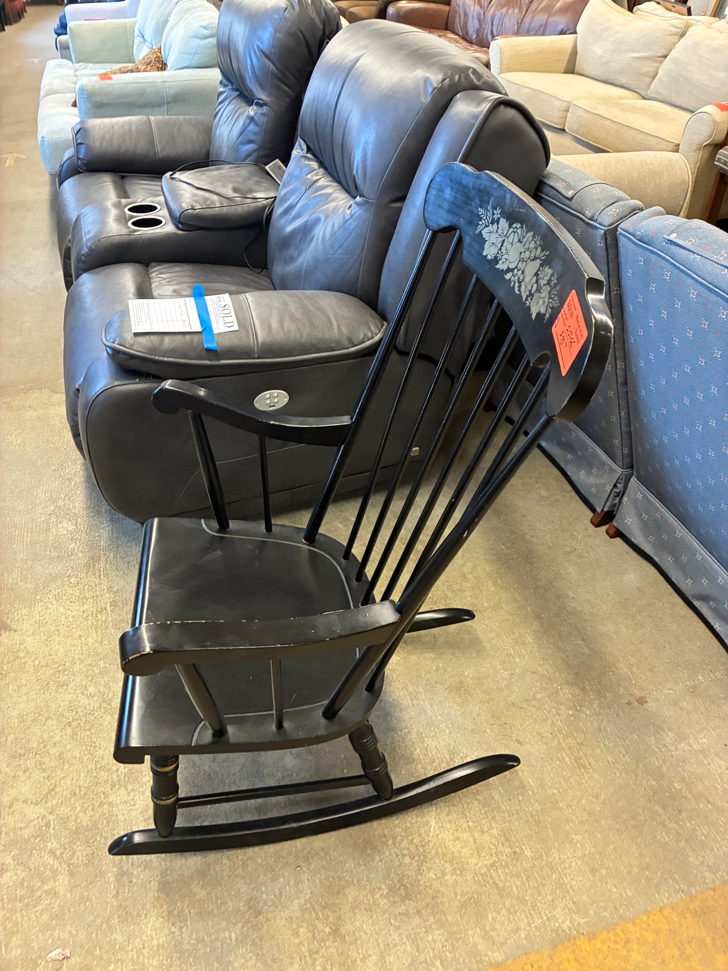 Black Wooden Rocking Chair with Decorative Back Detail