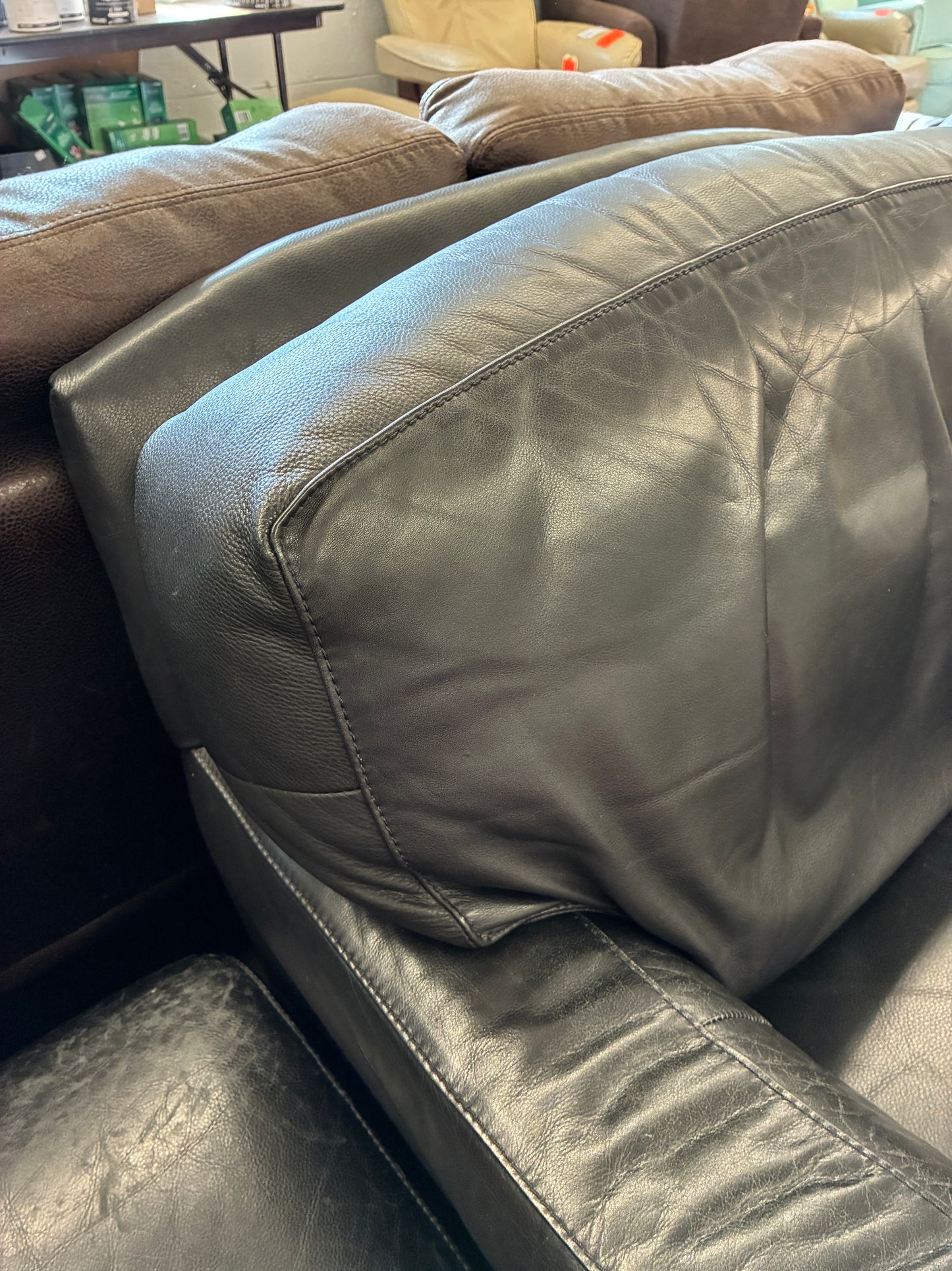 Black Leather Lounge Chair with Rolling Ottoman