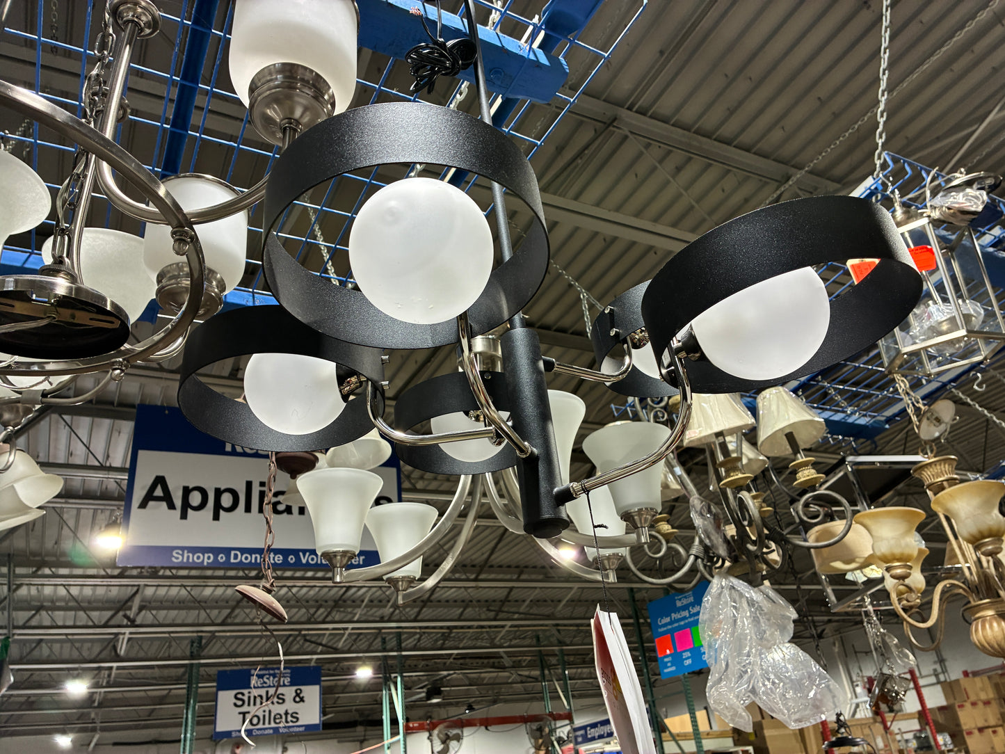 Modern Black Four Light Chandelier with Frosted Glass Shades