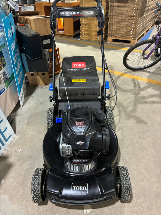 Black Toro Recycler Personal Pace Lawn Mower