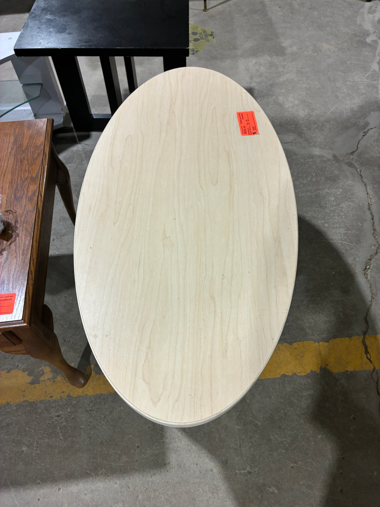 Oval Coffee Table with Light Wood Finish