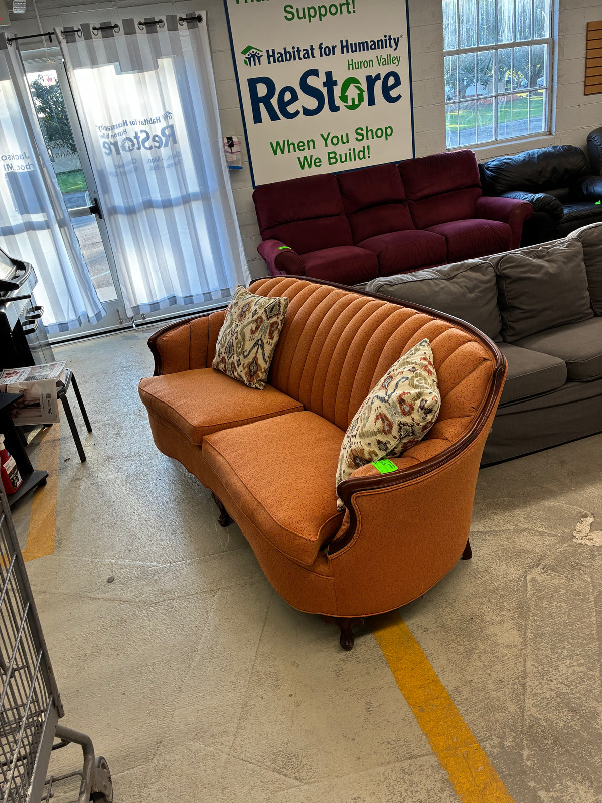 Traditional Orange Upholstered Sofa with Wood Trim