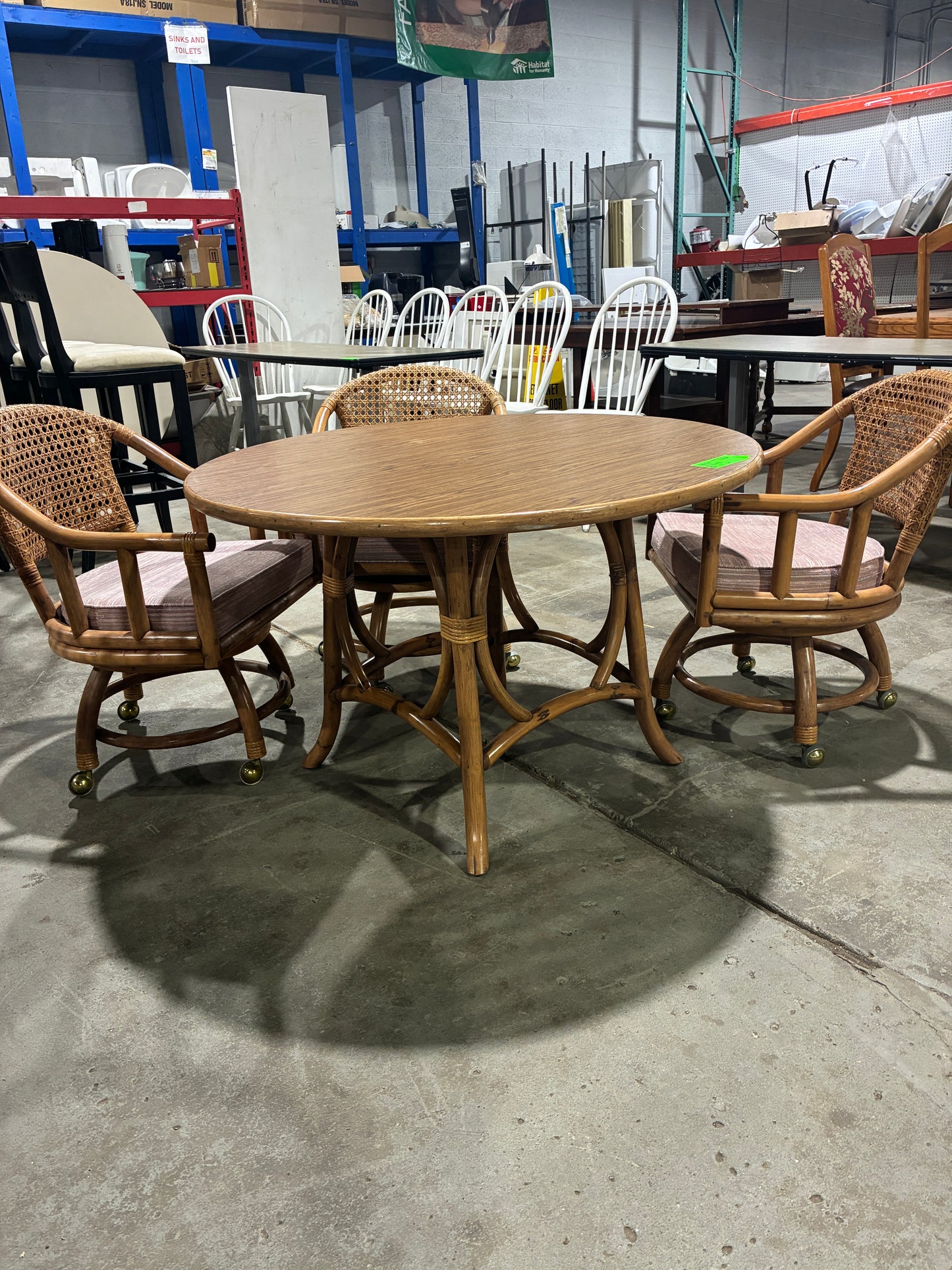 Vintage Rattan Dining Table & Four Rolling Armchairs