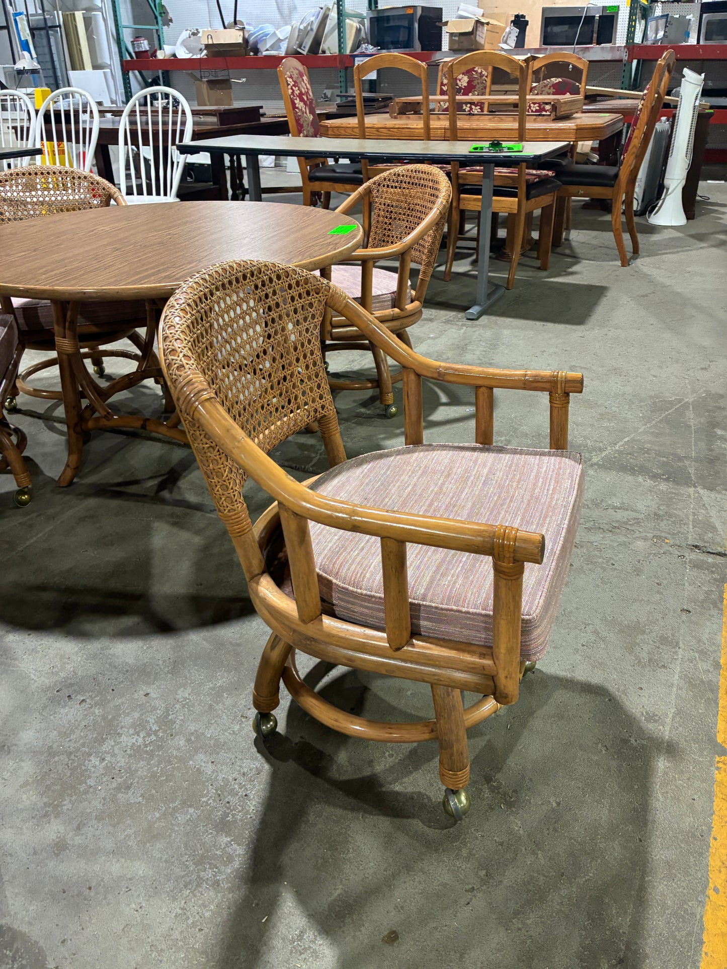 Vintage Rattan Dining Table & Four Rolling Armchairs