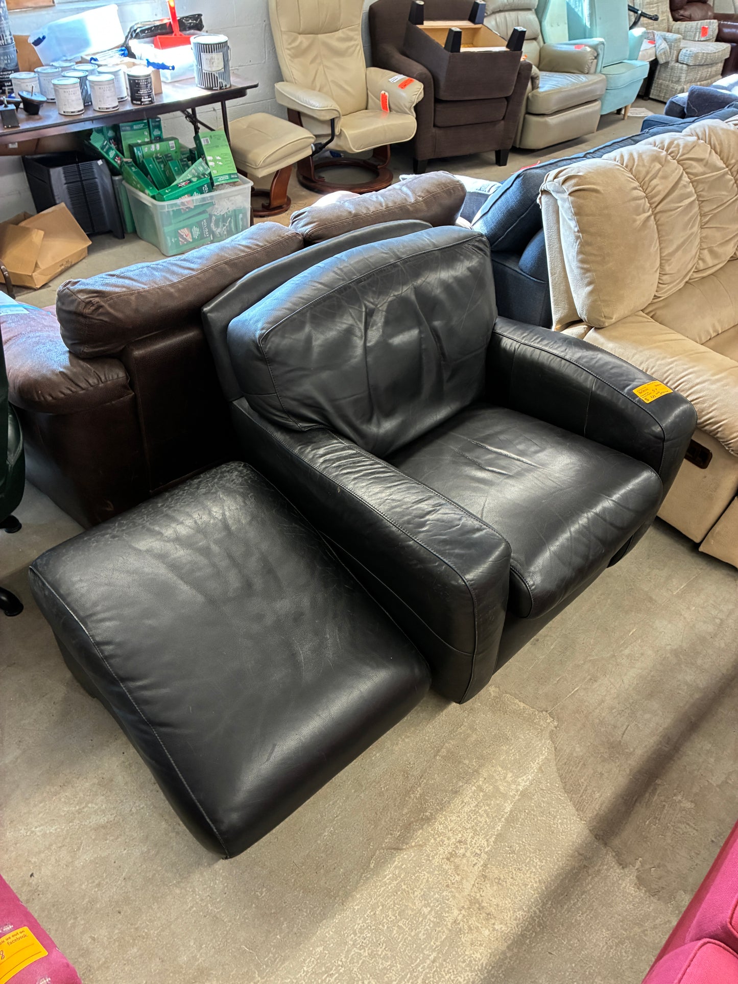 Black Leather Lounge Chair with Rolling Ottoman