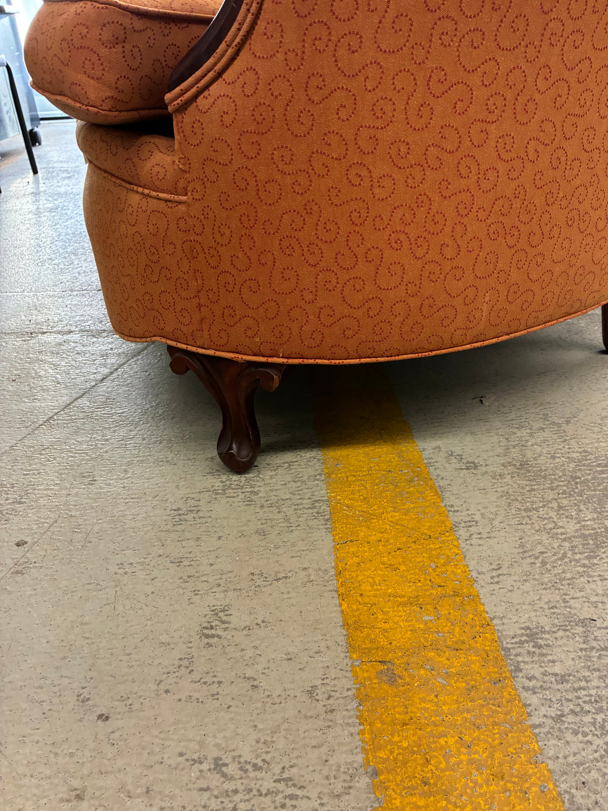 Traditional Orange Upholstered Sofa with Wood Trim