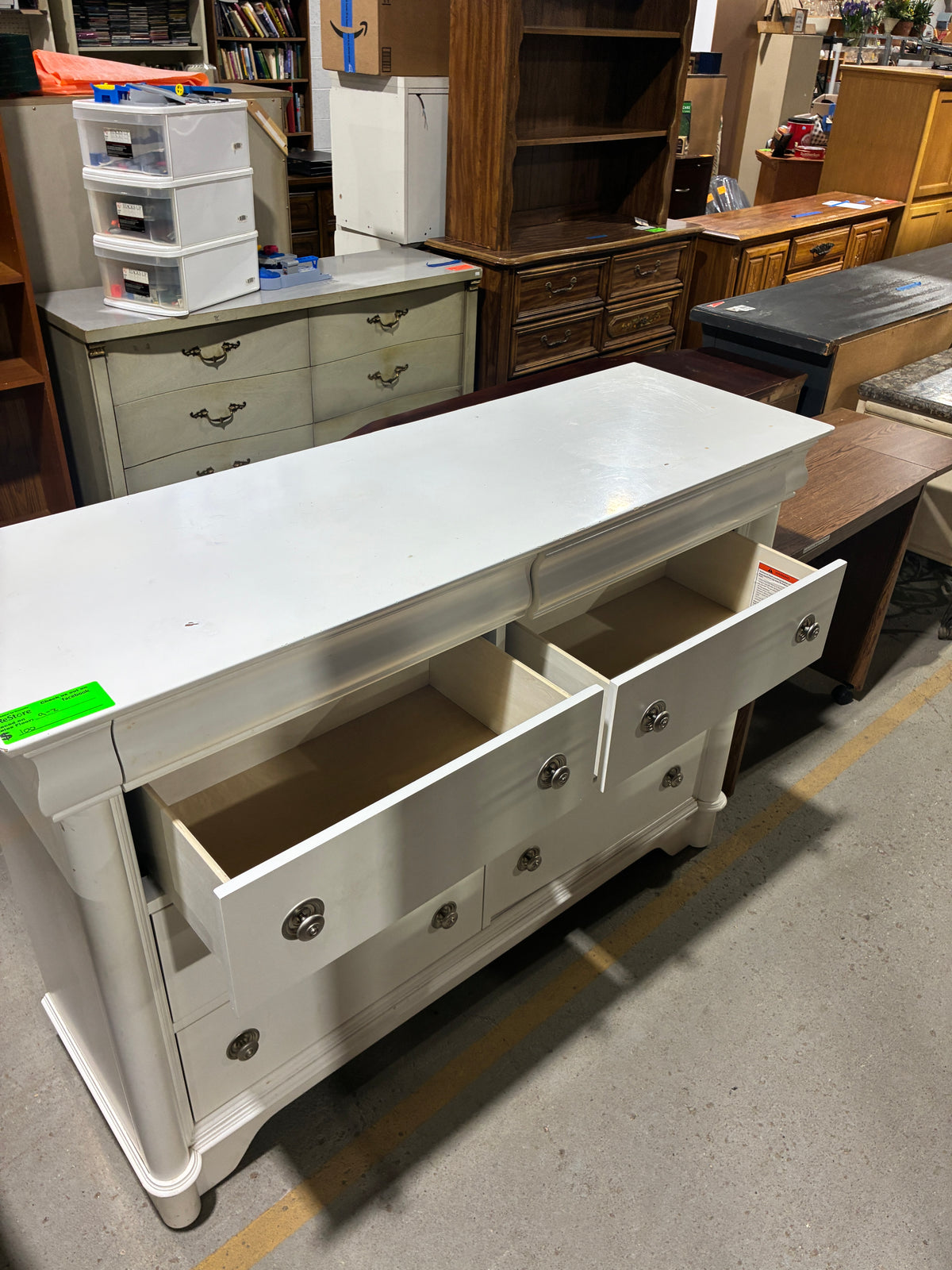 White Nine-Drawer Dresser with Classic Detailing