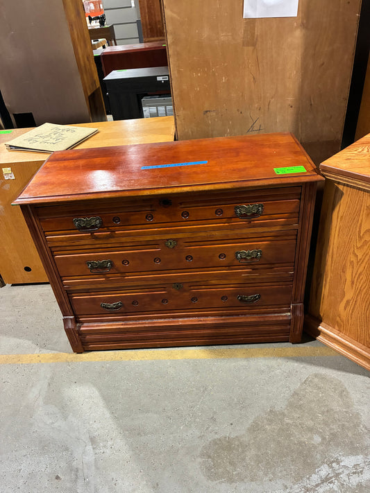 Vintage Three-Drawer Wood Dresser with Ornate Hardware