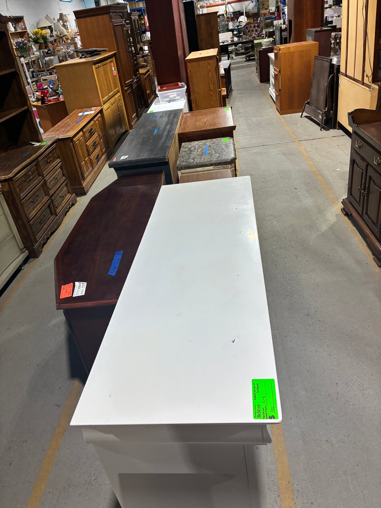 White Nine-Drawer Dresser with Classic Detailing