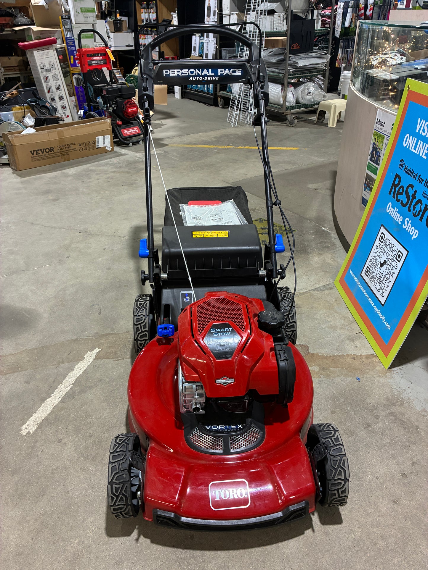 Red Toro Personal Pace Self-Propelled Lawn Mower