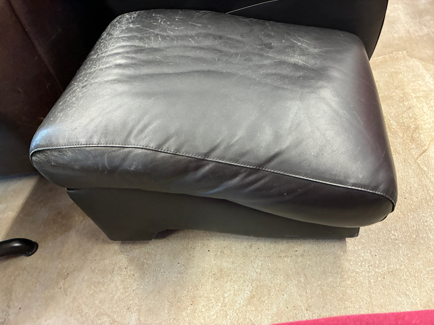 Black Leather Lounge Chair with Rolling Ottoman