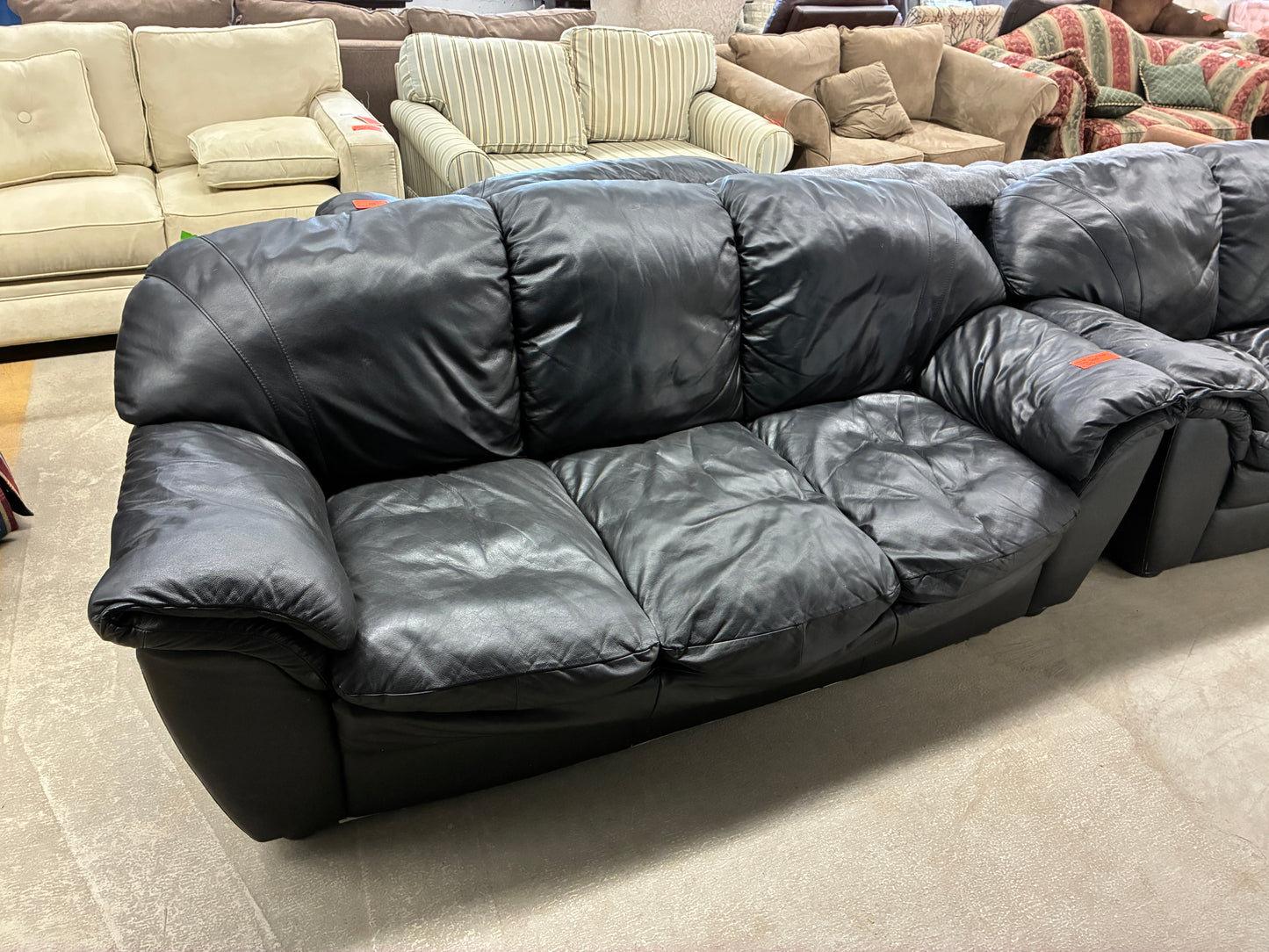 Black Leather Sofa with Plush Cushioning
